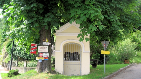 chapel and sign post